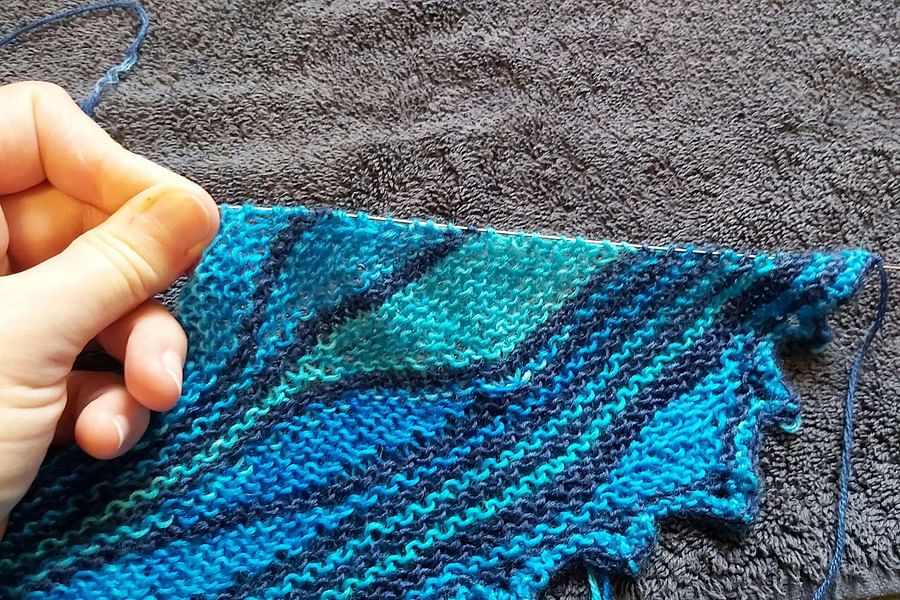 submerging knitted item in water