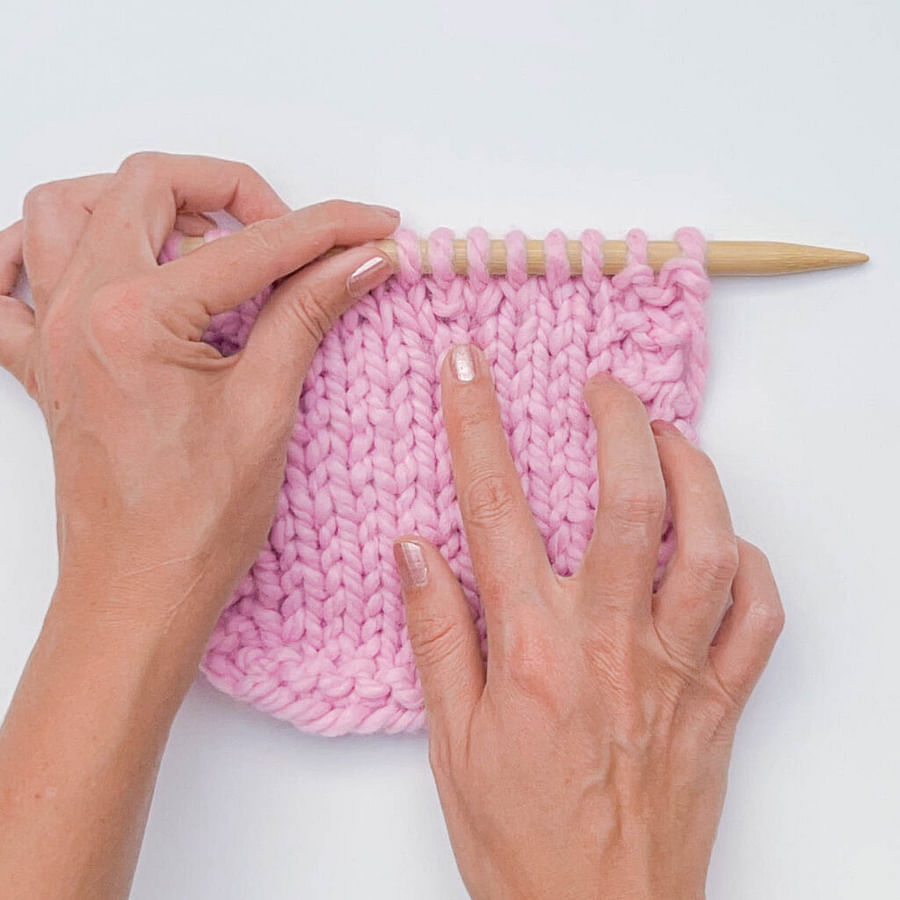 Close-up image of a knitted swatch using the Kfb knitting technique